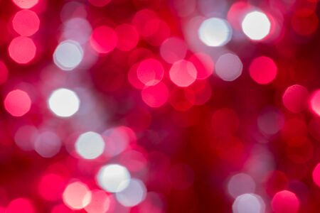 Christmas background with blur golden lightsの写真素材