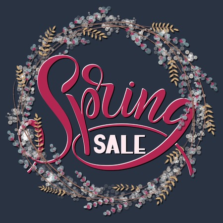 Spring Sale handwritten lettering with spring flowers wreath.の写真素材
