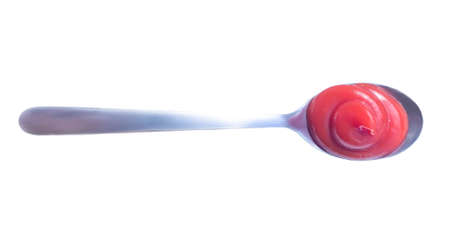 Ketchup red splashes isolated on white background. Tomato sauce top view. High resolution photoの写真素材