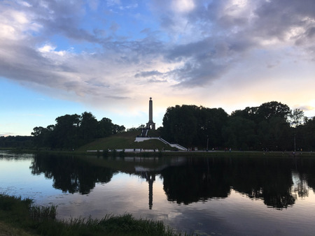 The mirror reflection in Lovat River in Velikiye Luki, Russiaの写真素材