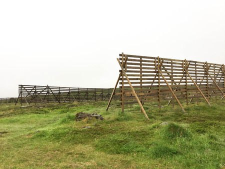 Fish drying racks shot on a cloudy day, Norwayの写真素材