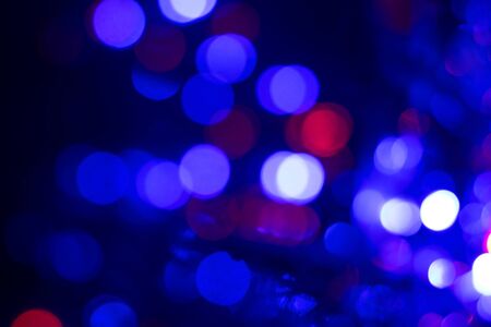 defocus blur of blue and red lights festive backgroundの写真素材