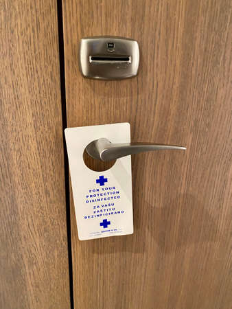 Split, Croatia - July 25, 2020: Sing of hotel room disinfected during COVID-19 pandemicのeditorial素材