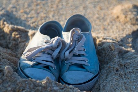 sneakers on the beachの写真素材
