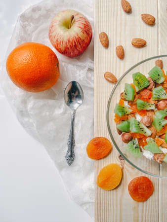 cottage cheese with fruits and nutsの写真素材
