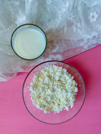 Cottage cheese and homemade milk in a glass dish