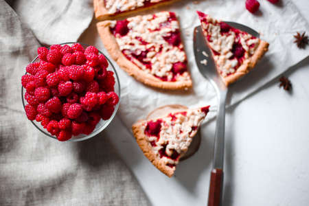 homemade strawberry pie on a white plate