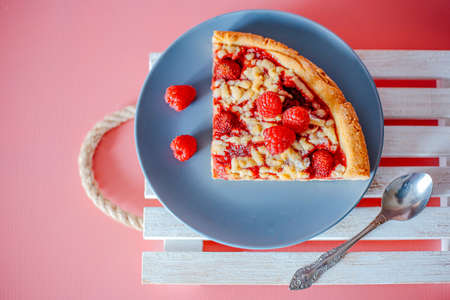 homemade strawberry pie with raspberries on the tableの写真素材