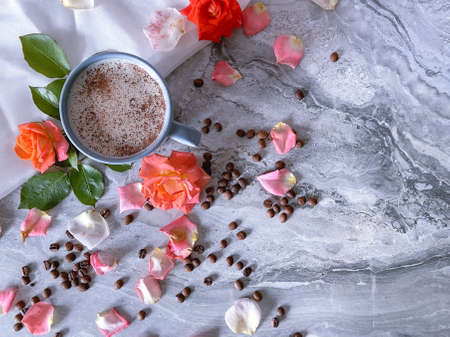 coffee mug cappuccino and flowers on gray backgroundの写真素材