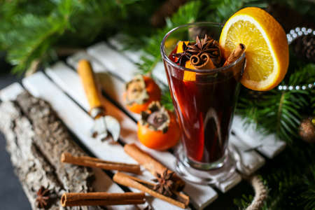 mulled wine, cinnamon sticks and Christmas tree branchesの写真素材