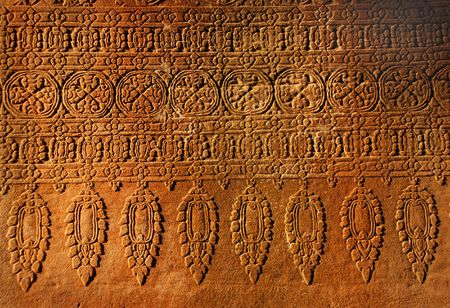 Old wall, stone ornament in antique Angkor Wat, Cambodia