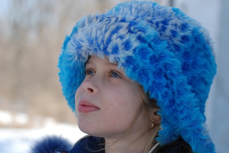 Russian little girl in fur cap, Siberiaの写真素材