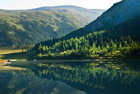 Forest lake, wild landscape, Ak-kem river, Altai, Russiaの写真素材