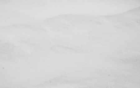 background of snow, natural snow texture, white backgroundの写真素材