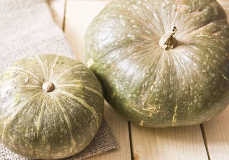 pumpkin, whole pumpkin on a wooden tableの写真素材