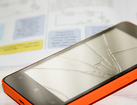 repair the phone, the phone screen is broken, the repair of equipmentの写真素材