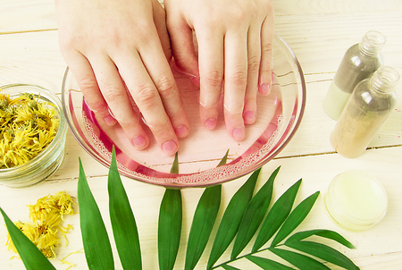 ray for manicure hand, rose water, colored clay, dried marigold flowersの写真素材