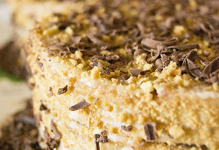 Cake, cake with cream and grated chocolate on top, honey cake
