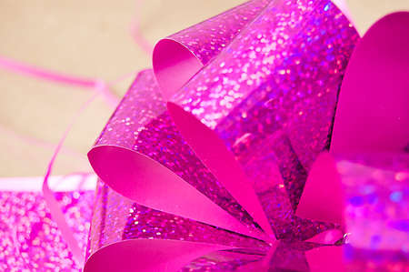 gift box with red ribbon on wood table. Selective focusの写真素材