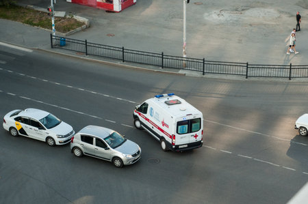 Ambulance car crossing the road at the crossroads, top viewのeditorial素材