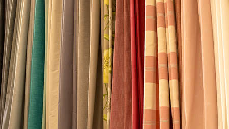 Colorful curtain samples. Fabrics in the store.の写真素材