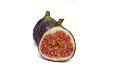 Two Ripe juicy figs isolated on a white background. Front View. One fruit in its entirety, the other photo in sectionの写真素材