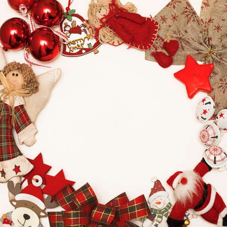 White background with red Merry Christmas decorations. Frame. Copy space, happy New year greetings in blog posts. Flat lay, owerview photo for wishes for friends, clients, kids. Winter timeの写真素材