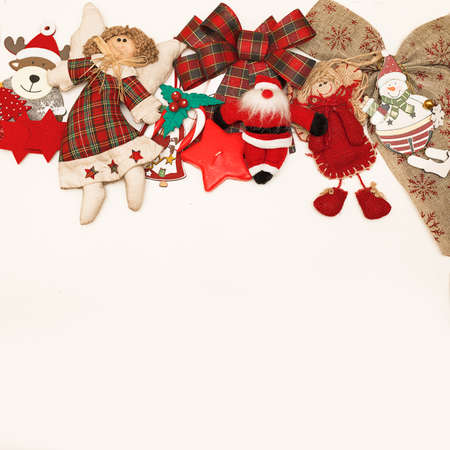 White background with red Christmas decorations. Frame. Copy space, happy New year greetings, merry...