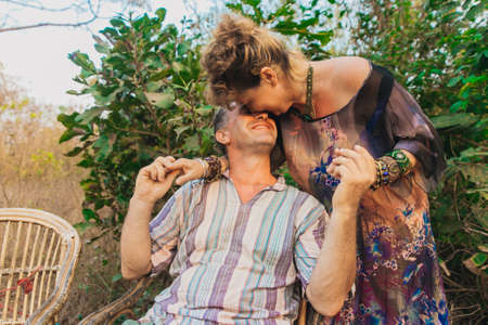 Elderly couple in love holding hands kissing nature india vacation dating concept relationship flirt india goaの写真素材