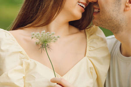 Beautiful moments of expressing love and tenderness to each other in nature. Happiness and serenity. Outdoor recreation. Right way of life. Happy relationship. Taking care of each other.の写真素材