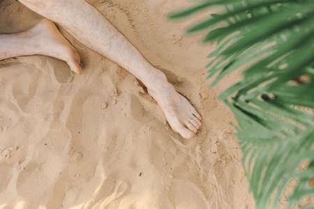 Wonderful moments of summer beach holiday. Travel and tourism. Rest and relaxation. Body care products for sunburn. Peace and enjoyment. It's great time. Rest at hotel. Lifestyle.の写真素材