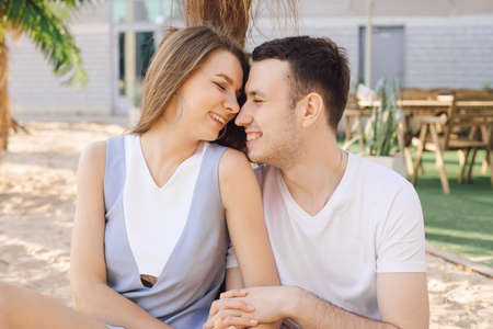 Happy couple in tropical hotel on their honeymoon. Recreation and tourism. Romantic relationships. Love and tenderness. Rest at hotel. Honeymoon. Wonderful moments of life. Lifestyle.の写真素材