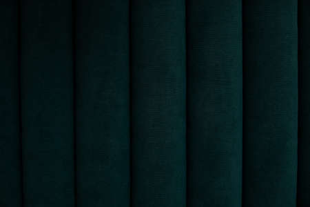 Background green velour textile, suede velvet sofa. Soft stripes backdrop, couch seat. Macro fashion photo. Close upの写真素材