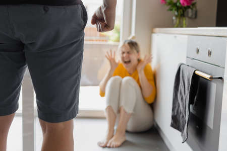 couple in problems with violence, husband or man attacking and threatening wife woman yelling in...