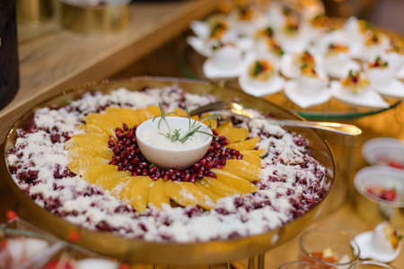 Fruit berry snacks , sprinkled with powdered sugar .Variety of fresh fruits on buffet table.