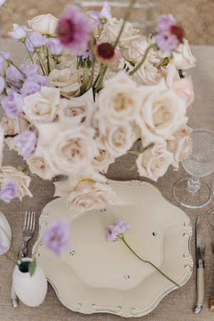 TopView wedding floristry and design. Serving festive wedding table withbouquets of roses,の写真素材