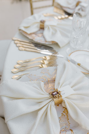 Fragment of wedding table setting. Wedding in classic style. Organization of weddings.の写真素材
