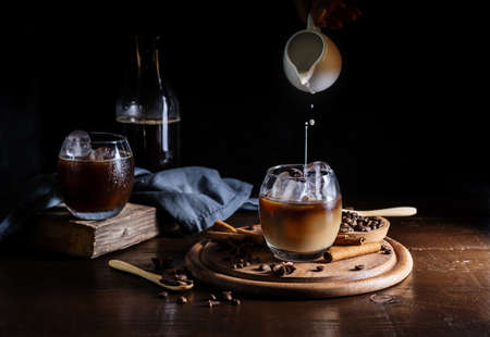 Ice coffe with milk in glassesの写真素材