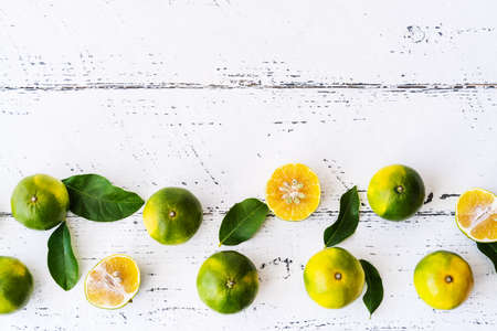 Mapo fruits on the white wooden table with copy space.