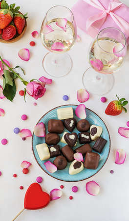 S.Valentines Day concept. S.Valentines Day concept. Chocolate candies, rose petals, gift box,...
