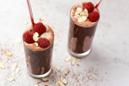 keto friendly almond chocolate smoothie with raspberriesの写真素材