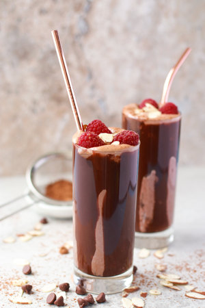 keto friendly almond chocolate smoothie with raspberriesの写真素材