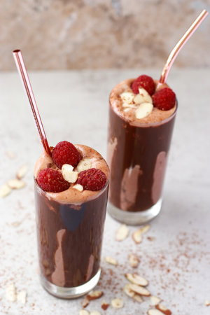 keto friendly almond chocolate smoothie with raspberriesの写真素材