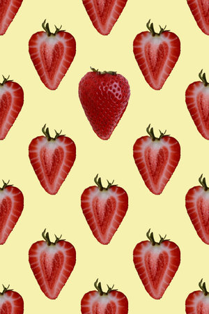 seamless pattern of fresh strawberry half on yellow background
