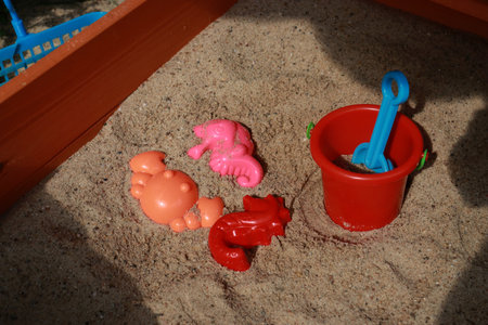 Childrens toys in the sand. Kids conceptの写真素材
