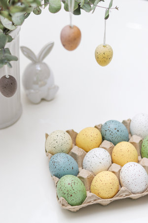 Colorful easter eggs decoration on white table