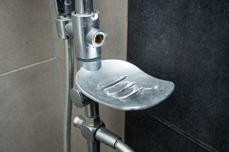 Close up of shower shelf with limescale. Home bathroom hygiene conceptの写真素材