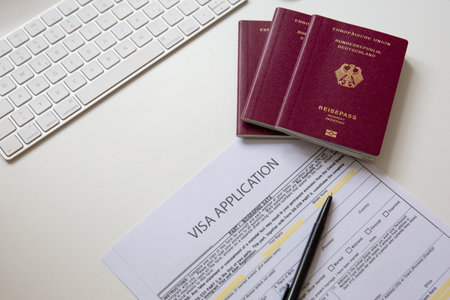 Close up of a visa application document with a German passport