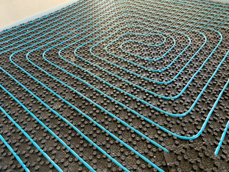 Modern under floor heating system installation in a new residential house.の写真素材