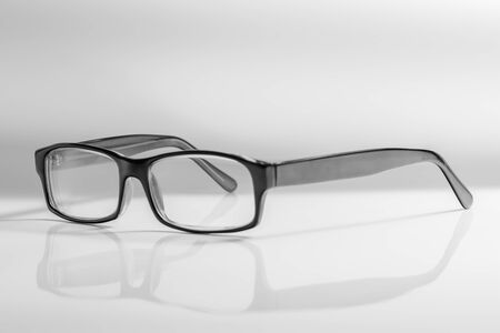 Glasses with transparent lenses in black frames